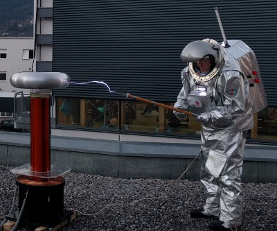 Analog astronaut holding the probe